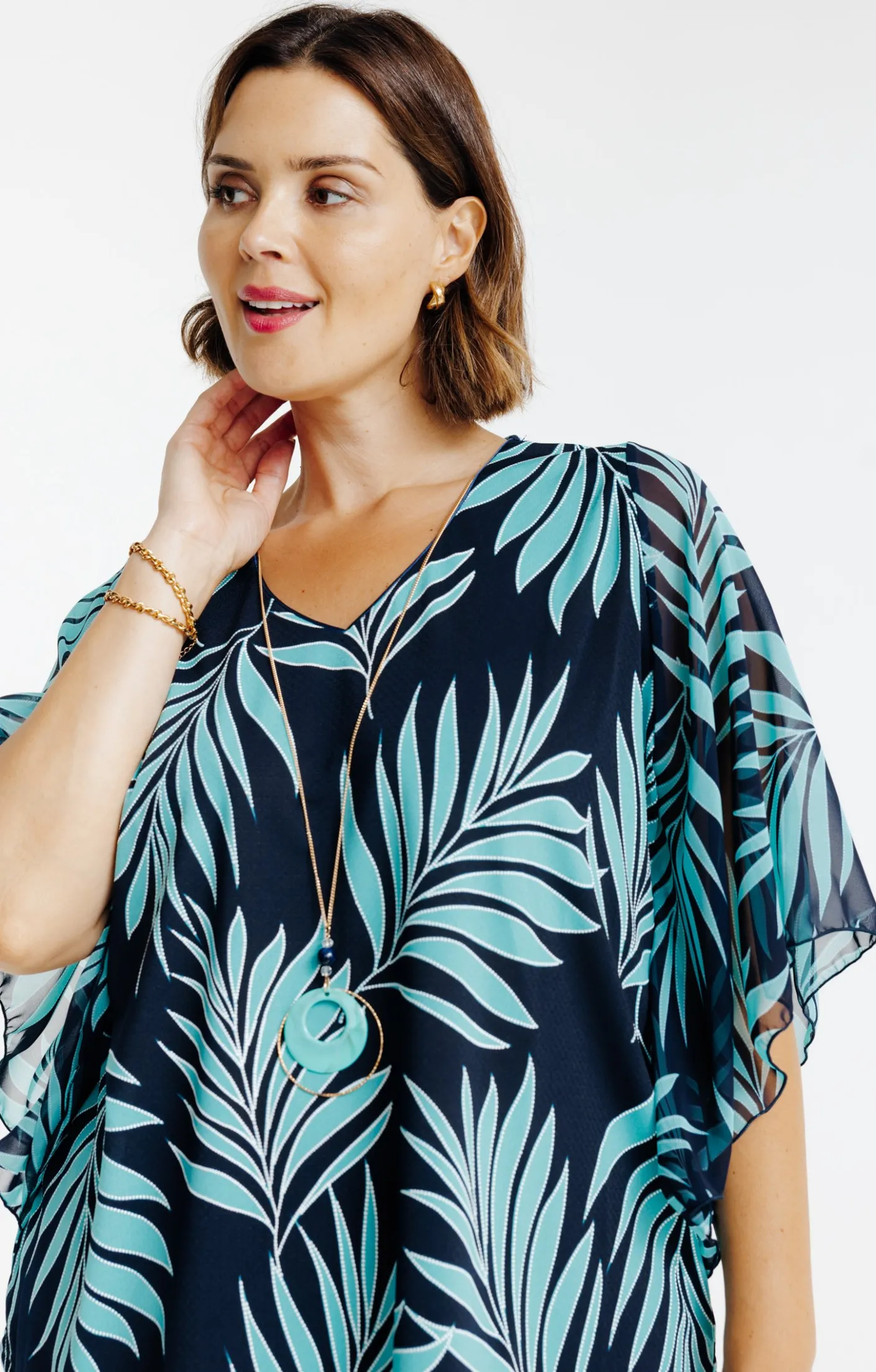 Toscane Boutique Tee-shirt poncho imprimé avec collier| Tee-shirts